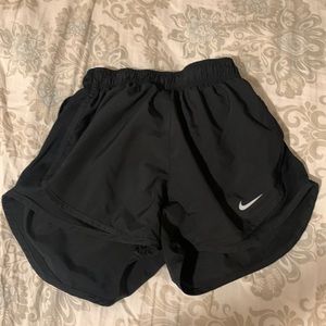 Black Nike shorts.